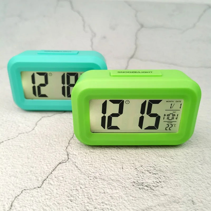 Battery Powered Mini Digital Alarm Clock Temperature Date Week Backlight Snooze Mute Table Clock 12/24H Countdown LCD Clock