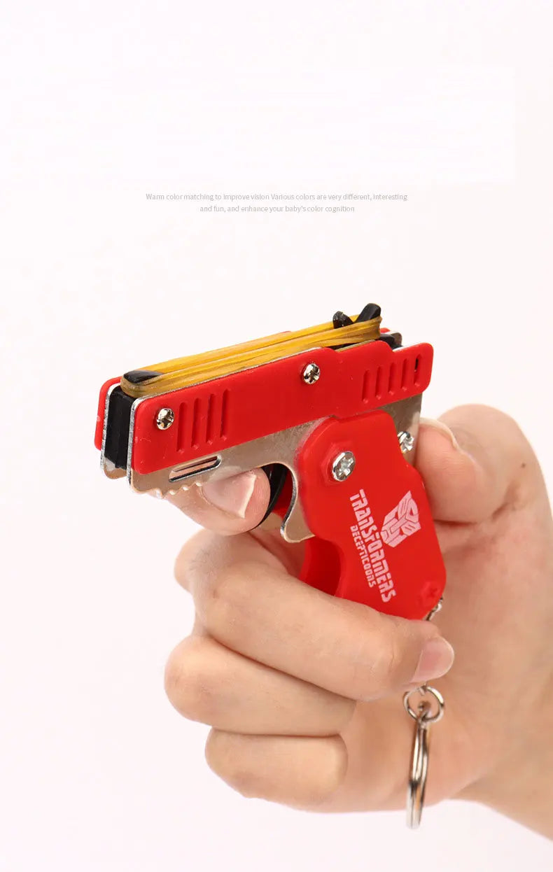 1PC MINI Toy Gun Keychain 50 Rubber Bands Folding Rubber Band Gun Shooting Pistol Alloy Key Charm Pendant Kid Outdoor Party Gift