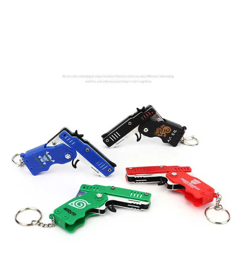 1PC MINI Toy Gun Keychain 50 Rubber Bands Folding Rubber Band Gun Shooting Pistol Alloy Key Charm Pendant Kid Outdoor Party Gift