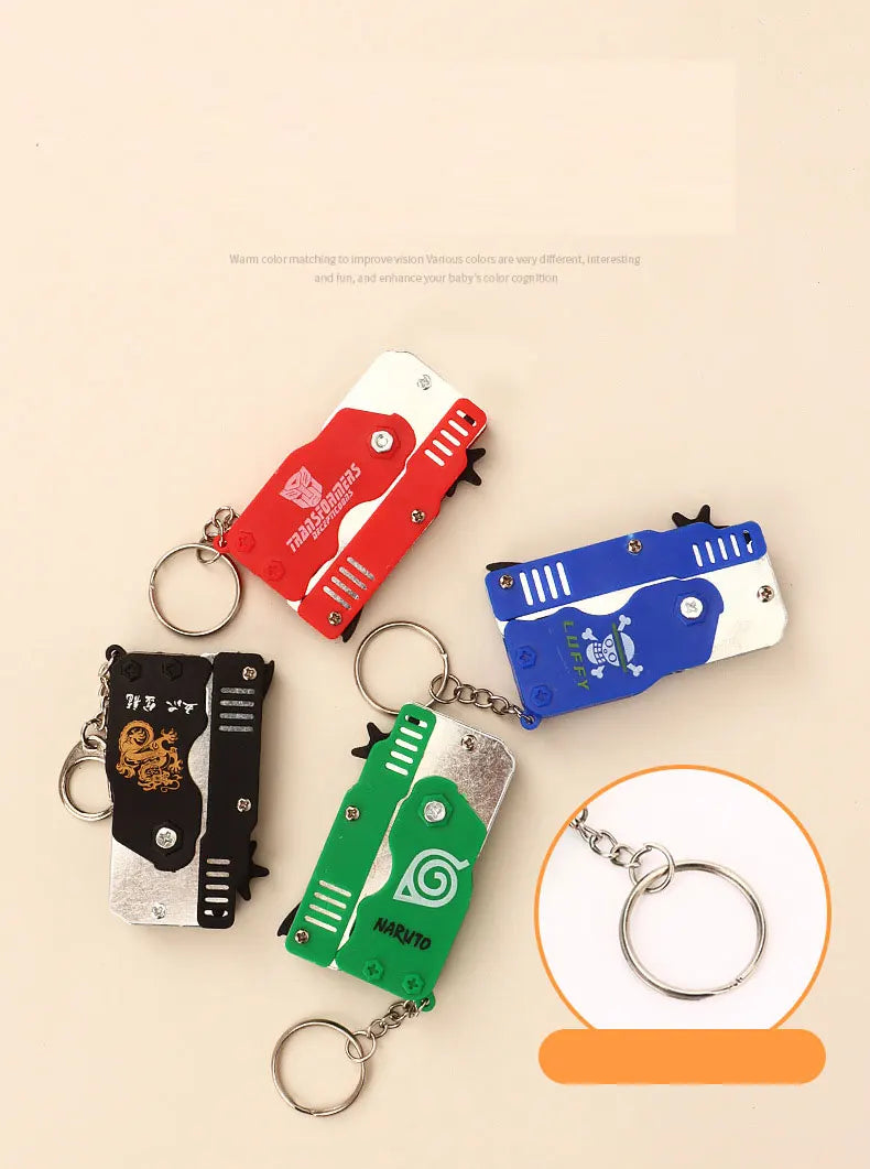 1PC MINI Toy Gun Keychain 50 Rubber Bands Folding Rubber Band Gun Shooting Pistol Alloy Key Charm Pendant Kid Outdoor Party Gift