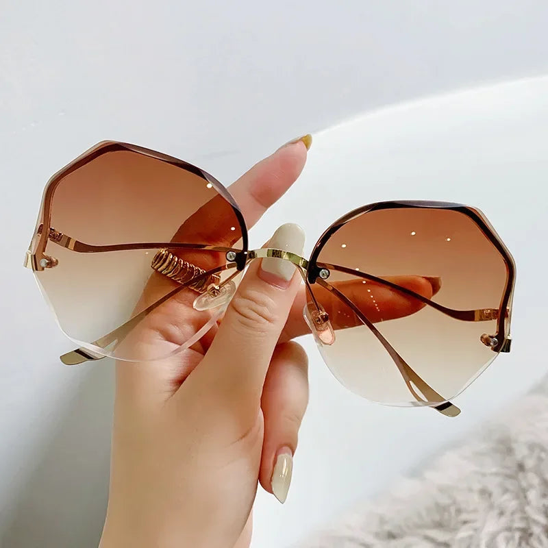 2023 Borderless Trimmed Fashionable Sunglasses Women UV Protection Irregular Round Oversized Sunglasses Ocean Lense SunGlasses