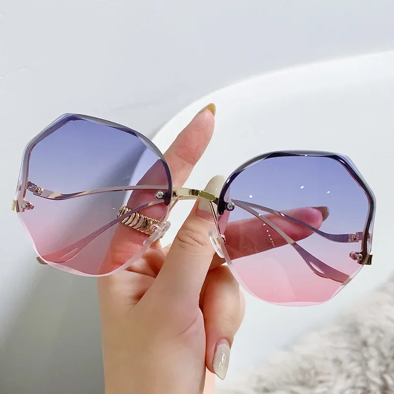 2023 Borderless Trimmed Fashionable Sunglasses Women UV Protection Irregular Round Oversized Sunglasses Ocean Lense SunGlasses