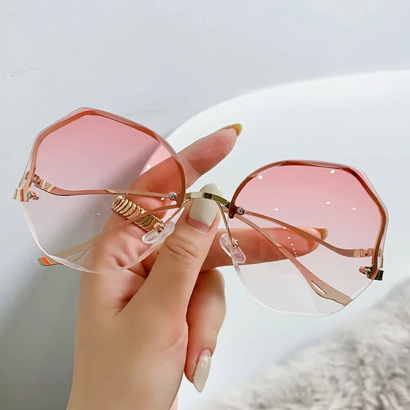 2023 Borderless Trimmed Fashionable Sunglasses Women UV Protection Irregular Round Oversized Sunglasses Ocean Lense SunGlasses