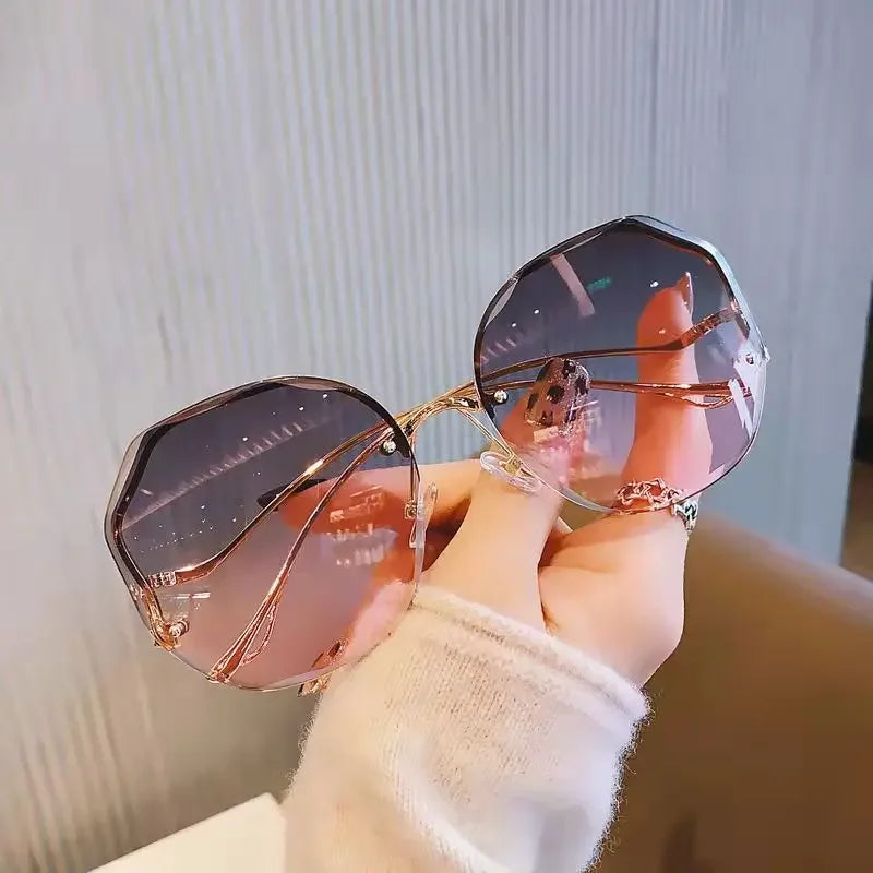2023 Borderless Trimmed Fashionable Sunglasses Women UV Protection Irregular Round Oversized Sunglasses Ocean Lense SunGlasses