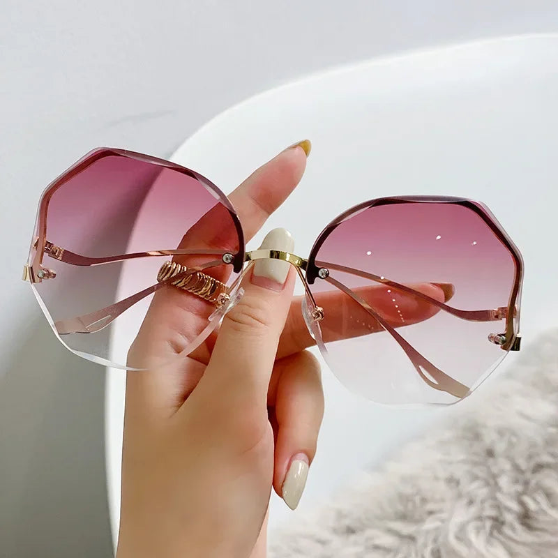 2023 Borderless Trimmed Fashionable Sunglasses Women UV Protection Irregular Round Oversized Sunglasses Ocean Lense SunGlasses