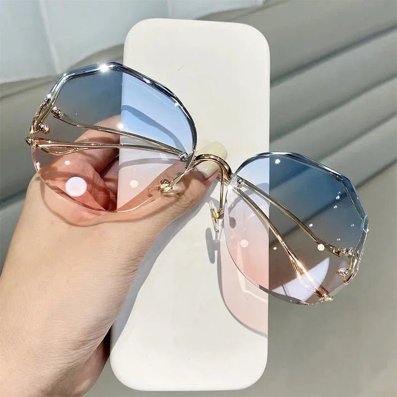 2023 Borderless Trimmed Fashionable Sunglasses Women UV Protection Irregular Round Oversized Sunglasses Ocean Lense SunGlasses