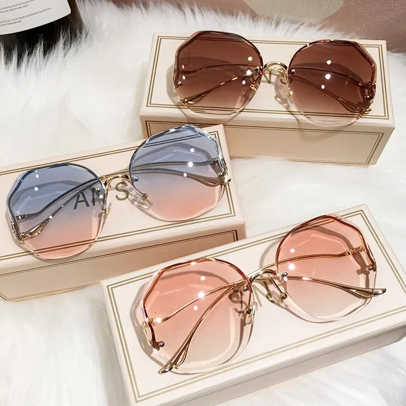 2023 Borderless Trimmed Fashionable Sunglasses Women UV Protection Irregular Round Oversized Sunglasses Ocean Lense SunGlasses